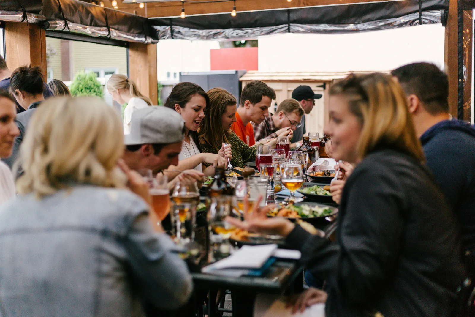 Friends and family sharing a meal together at TestB